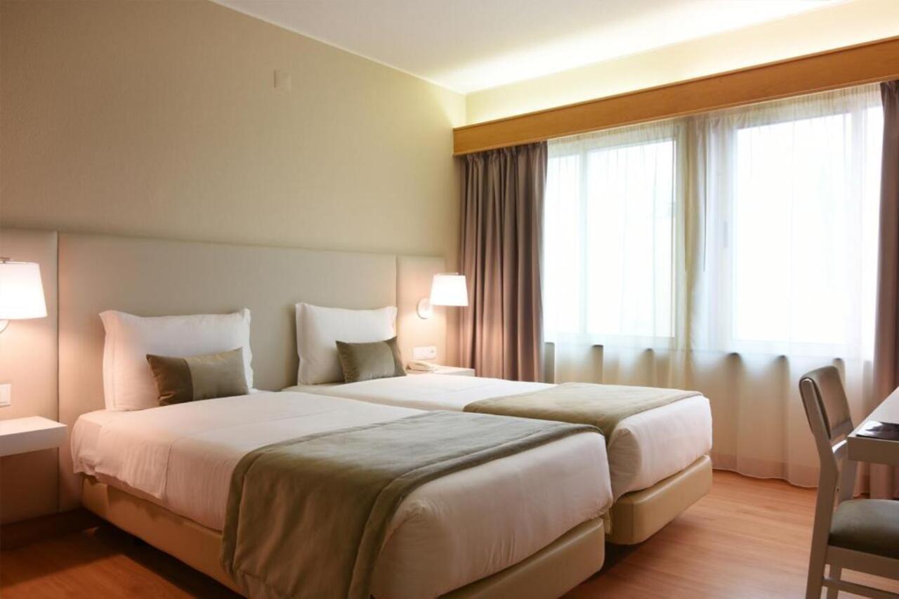 Exe Wellington Hotel Фигейра да Фош Екстериор снимка