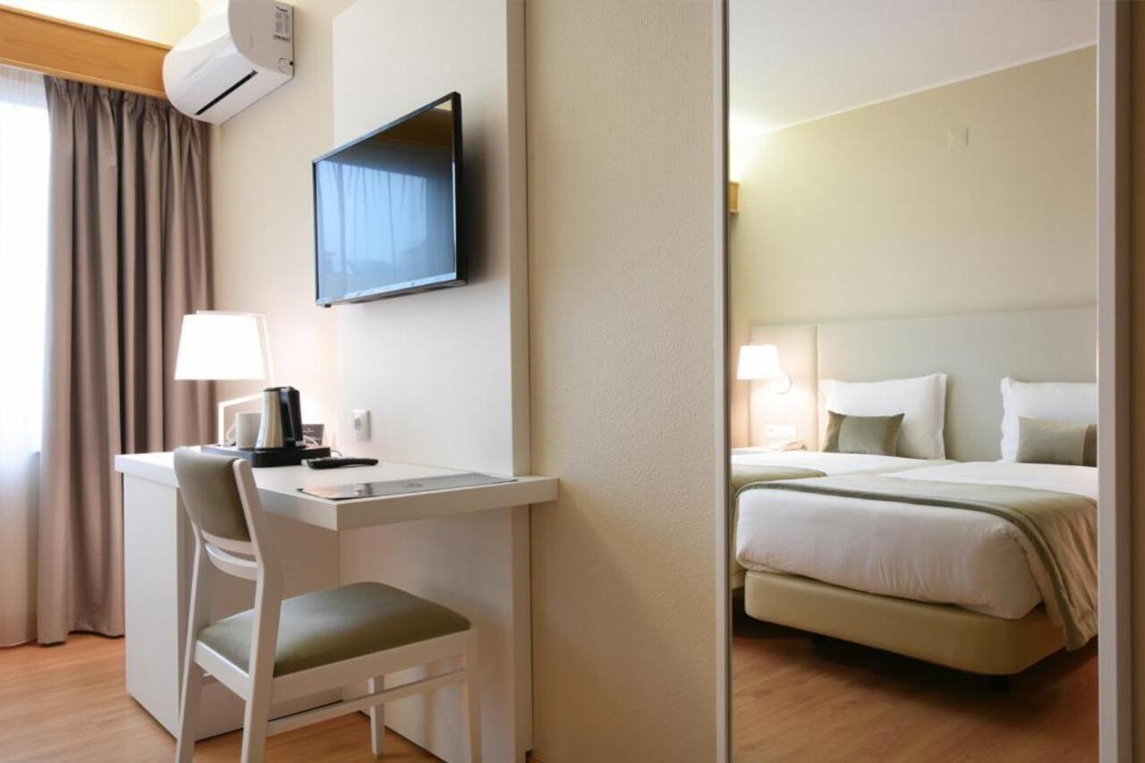 Exe Wellington Hotel Фигейра да Фош Екстериор снимка