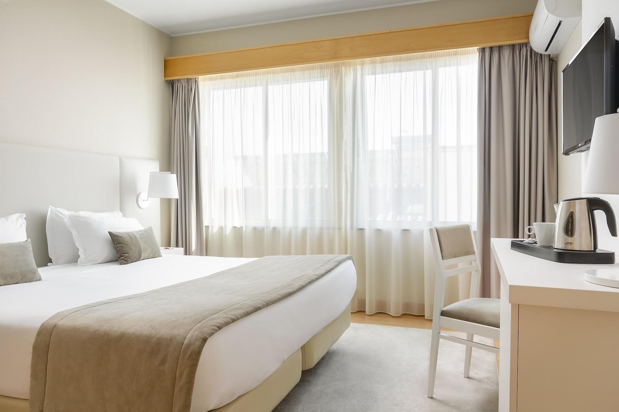Exe Wellington Hotel Фигейра да Фош Екстериор снимка